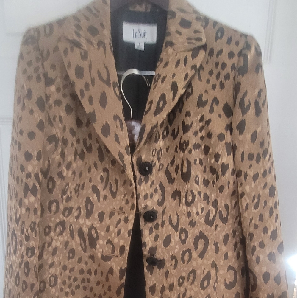 Le Suit- suit with gorgeous animal print jacket & solid colored matching skirt.